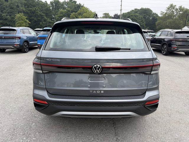 new 2025 Volkswagen Taos car, priced at $27,011