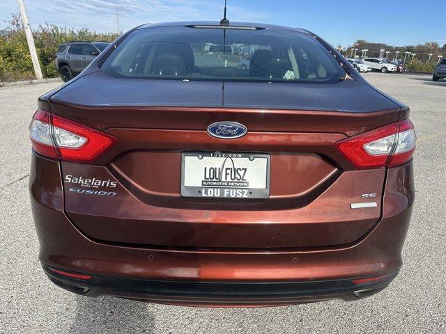 used 2016 Ford Fusion car, priced at $15,990