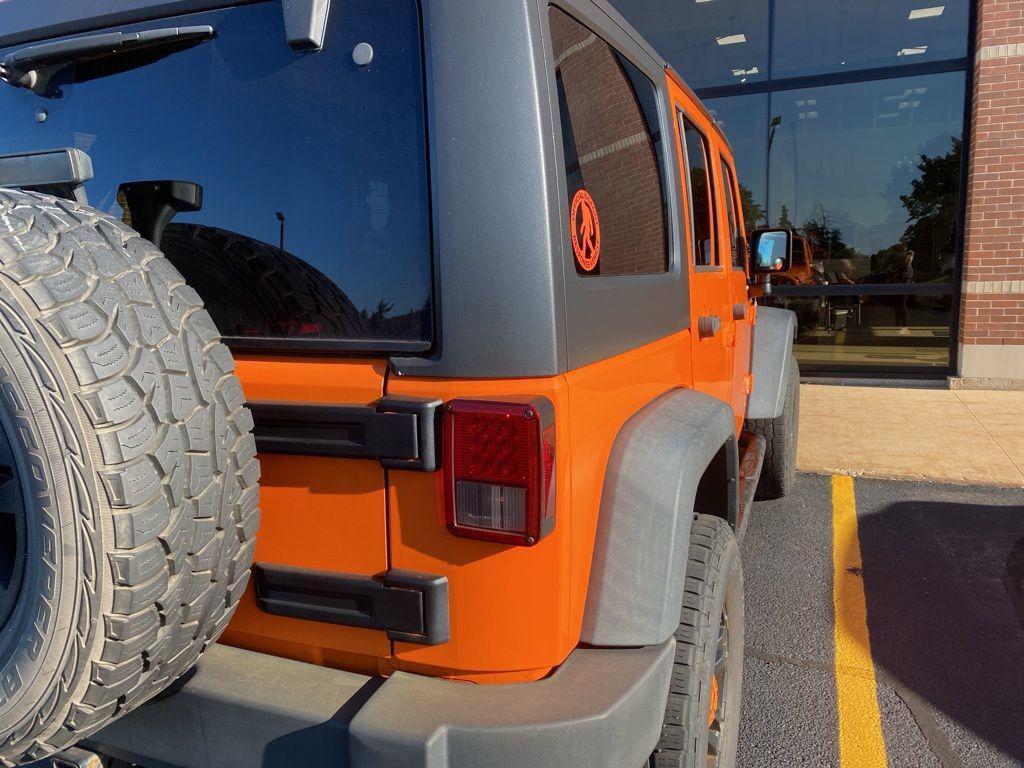 used 2013 Jeep Wrangler Unlimited car, priced at $11,995