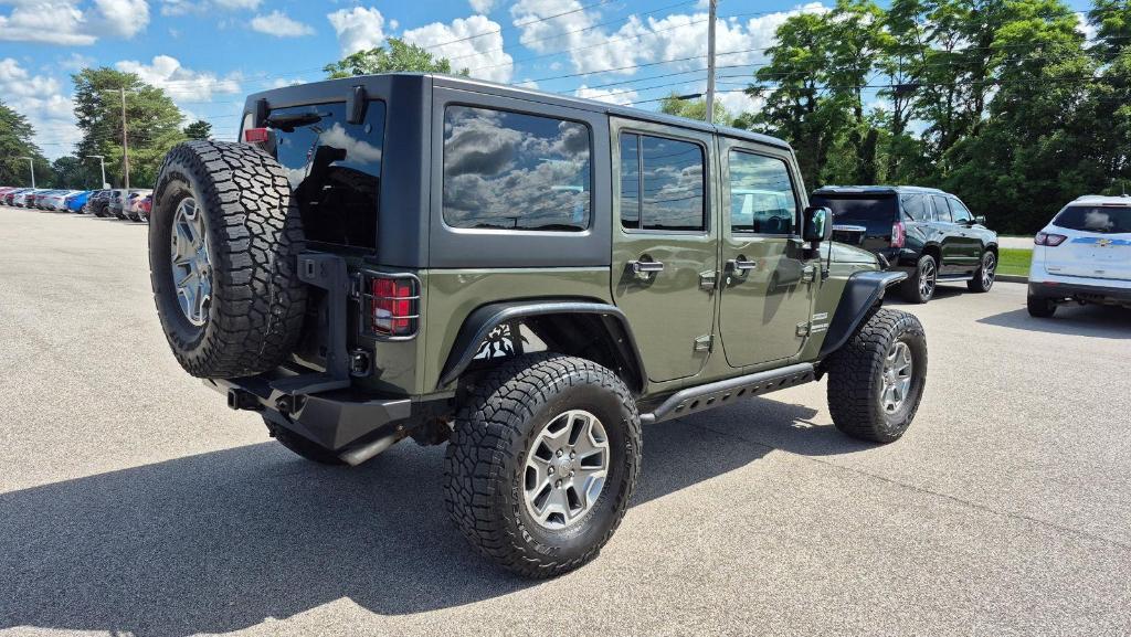 used 2016 Jeep Wrangler Unlimited car, priced at $21,745
