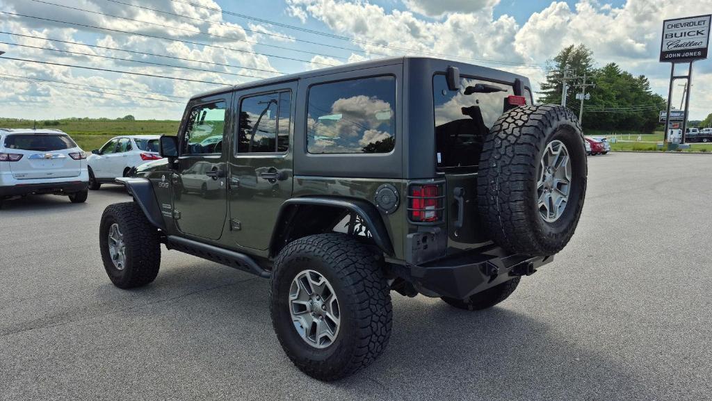 used 2016 Jeep Wrangler Unlimited car, priced at $21,745