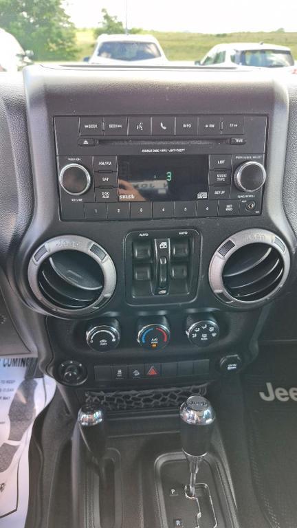 used 2016 Jeep Wrangler Unlimited car, priced at $21,745