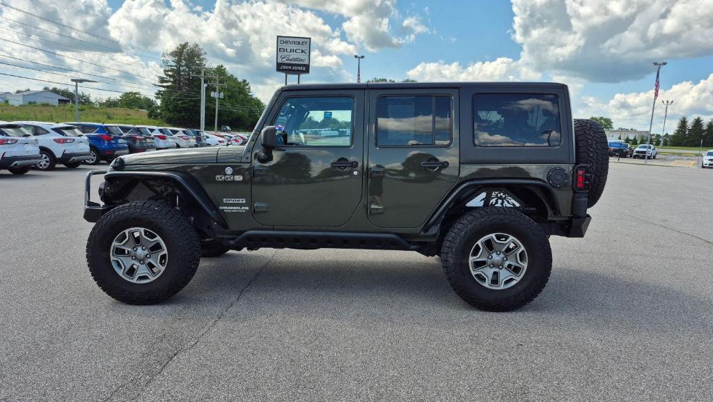 used 2016 Jeep Wrangler Unlimited car, priced at $21,745