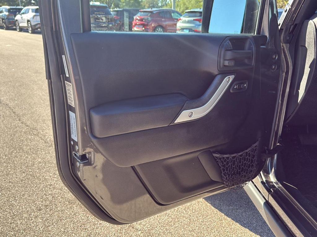 used 2016 Jeep Wrangler Unlimited car, priced at $23,445