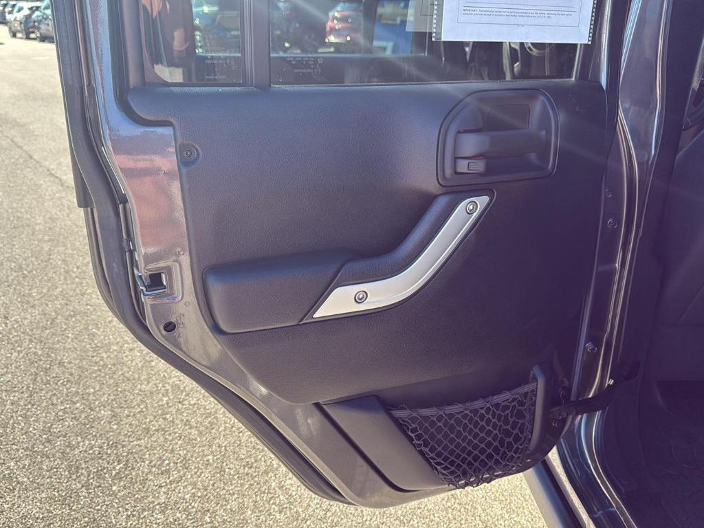 used 2016 Jeep Wrangler Unlimited car, priced at $23,445