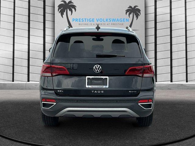 used 2022 Volkswagen Taos car, priced at $23,687