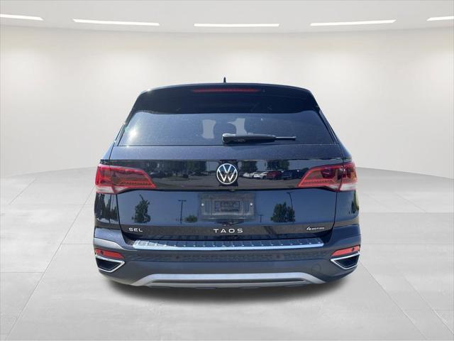used 2023 Volkswagen Taos car, priced at $22,500