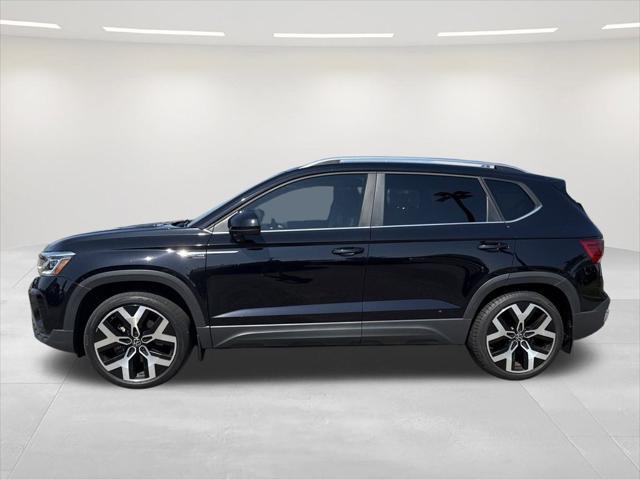 used 2023 Volkswagen Taos car, priced at $22,500