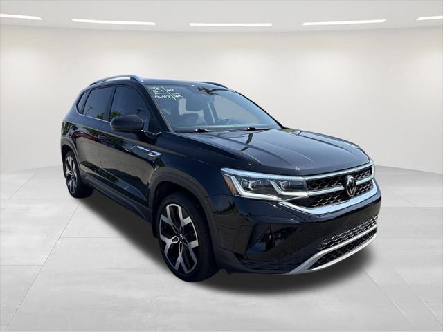 used 2023 Volkswagen Taos car, priced at $22,500