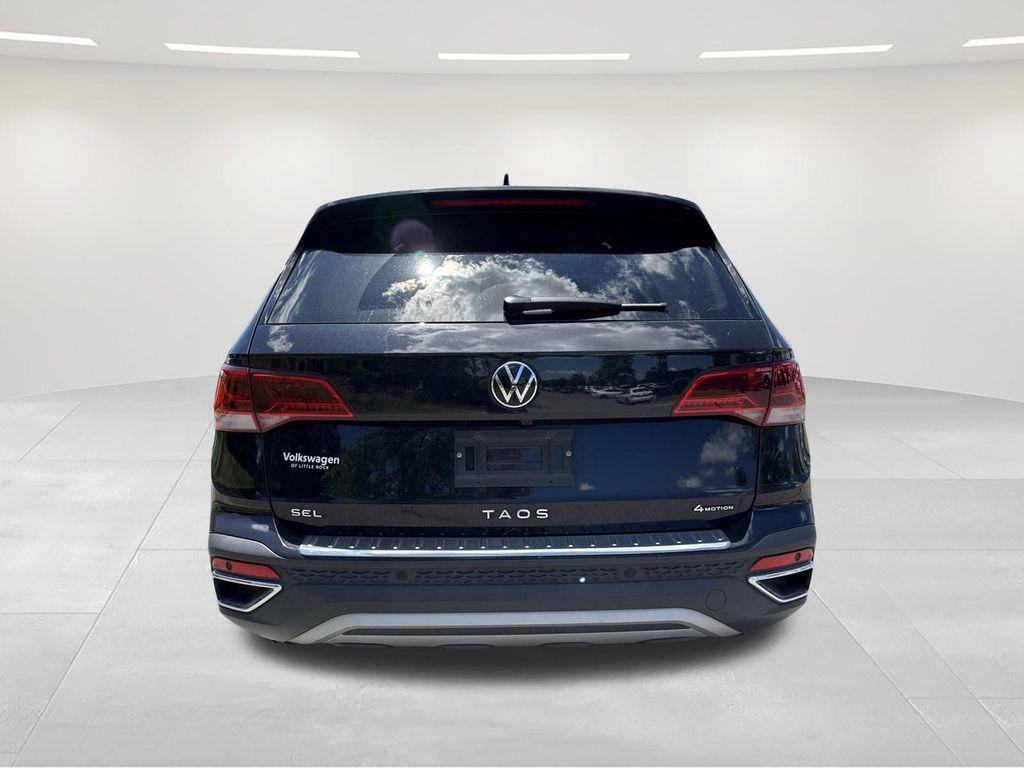 used 2024 Volkswagen Taos car, priced at $25,000