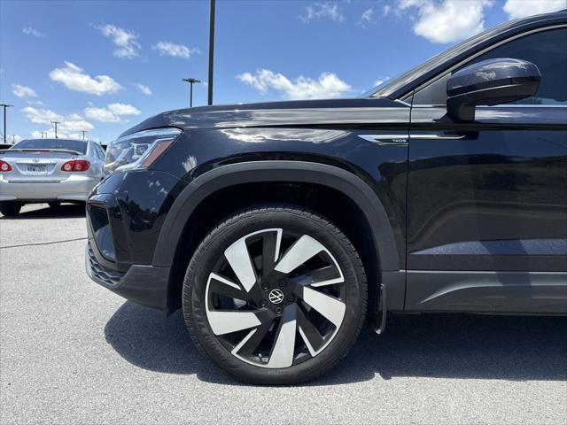 used 2024 Volkswagen Taos car, priced at $27,000