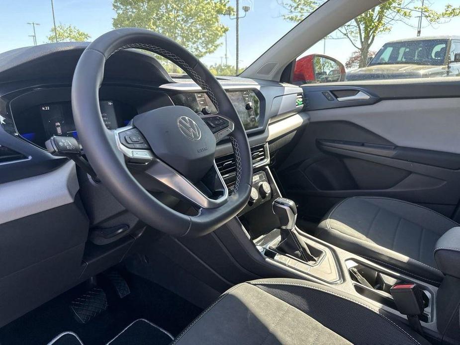 used 2023 Volkswagen Taos car, priced at $23,000