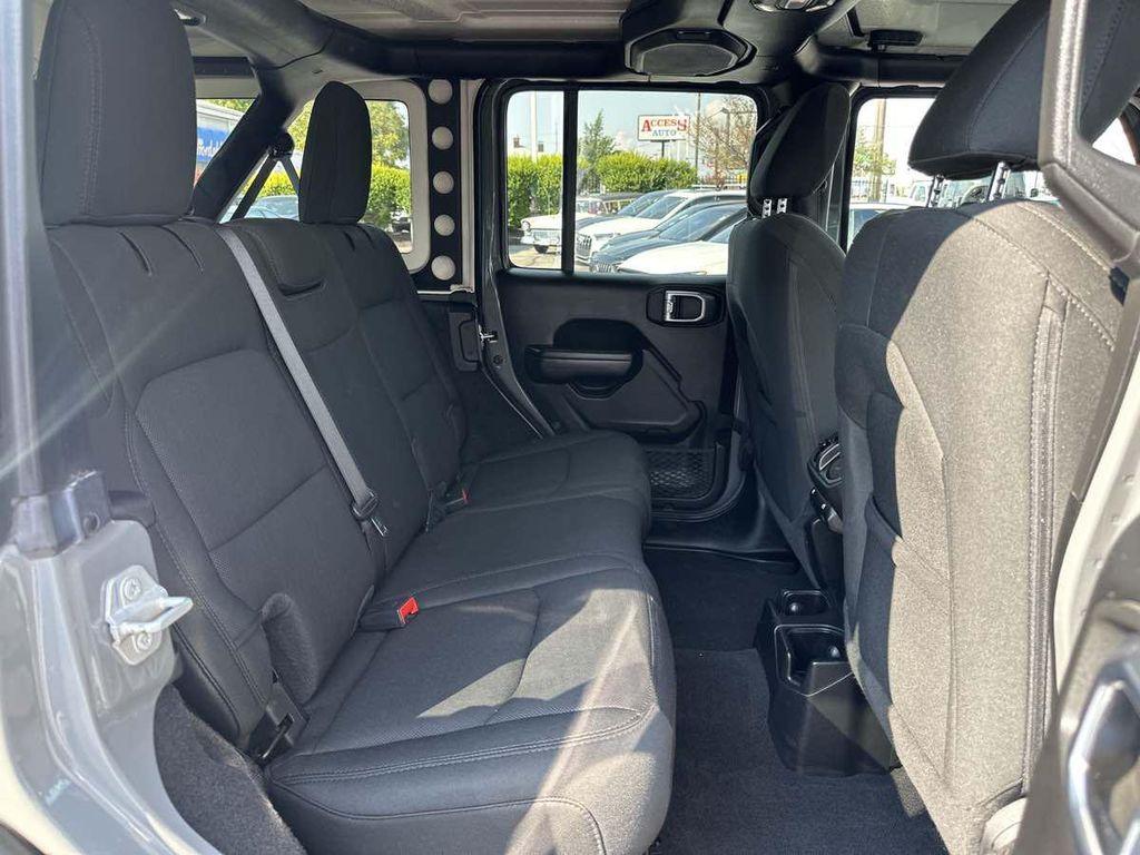 used 2021 Jeep Wrangler Unlimited car, priced at $31,910