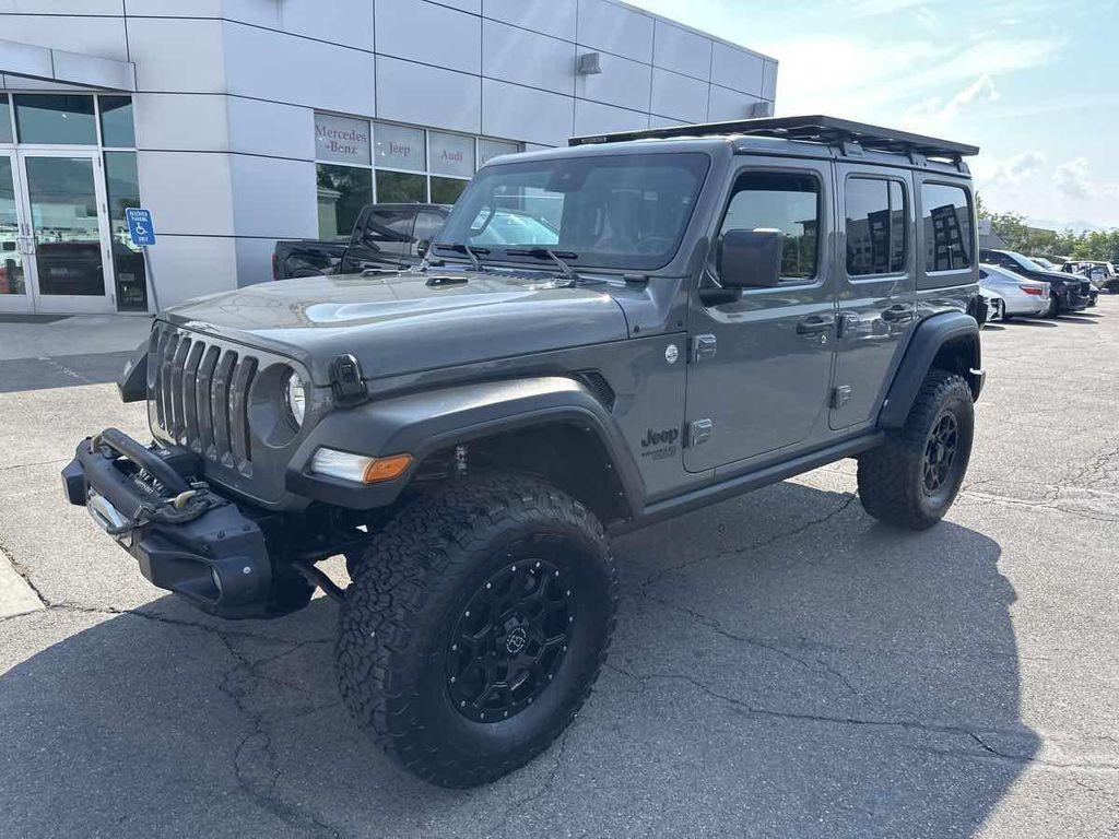 used 2021 Jeep Wrangler Unlimited car, priced at $31,910