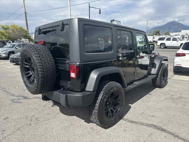 used 2013 Jeep Wrangler Unlimited car, priced at $16,910