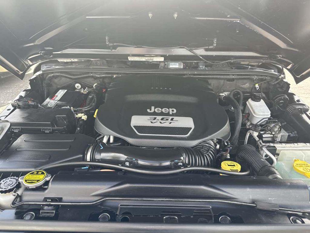 used 2013 Jeep Wrangler Unlimited car, priced at $14,910