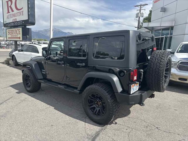 used 2013 Jeep Wrangler Unlimited car, priced at $16,910