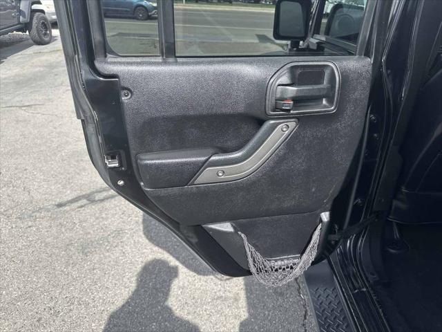used 2013 Jeep Wrangler Unlimited car, priced at $16,910