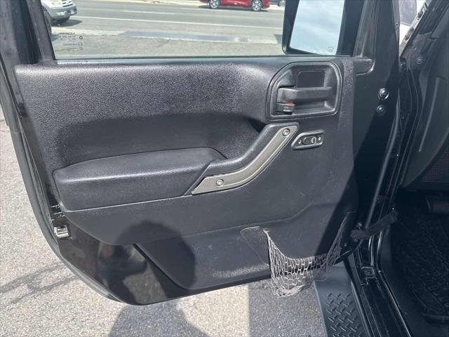used 2013 Jeep Wrangler Unlimited car, priced at $16,910