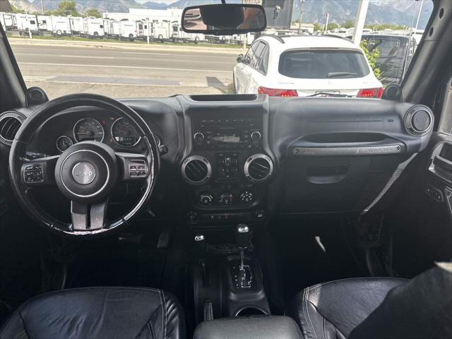 used 2013 Jeep Wrangler Unlimited car, priced at $16,910