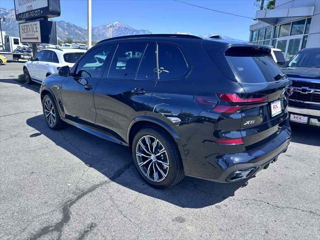 used 2025 BMW X5 car, priced at $69,910