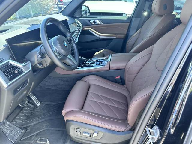 used 2025 BMW X5 car, priced at $69,910