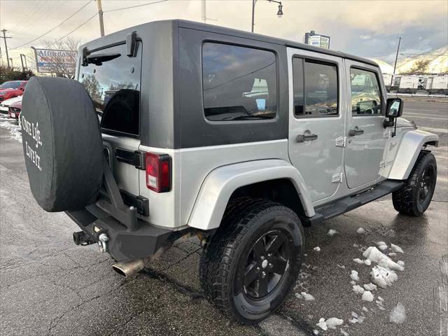 used 2010 Jeep Wrangler Unlimited car, priced at $13,910