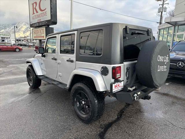 used 2010 Jeep Wrangler Unlimited car, priced at $13,910