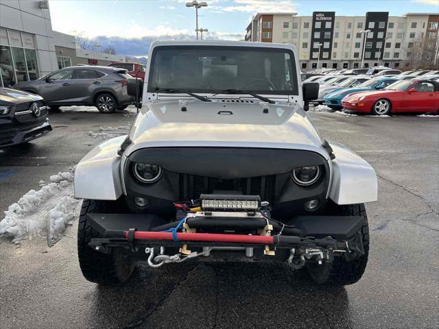 used 2010 Jeep Wrangler Unlimited car, priced at $13,910