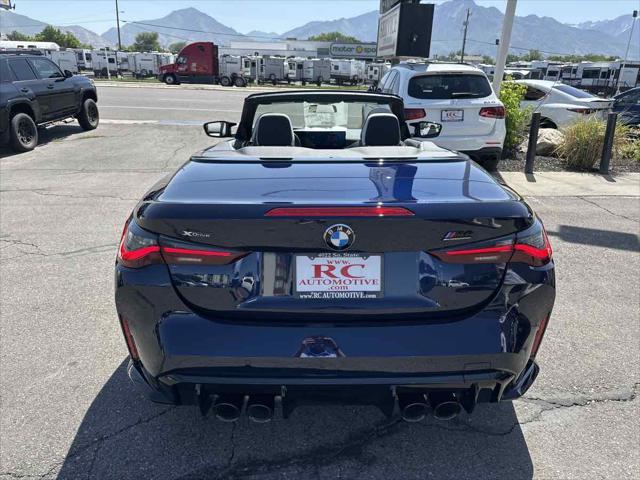 used 2024 BMW M4 car, priced at $86,910