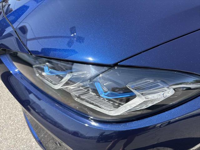 used 2024 BMW M4 car, priced at $86,910
