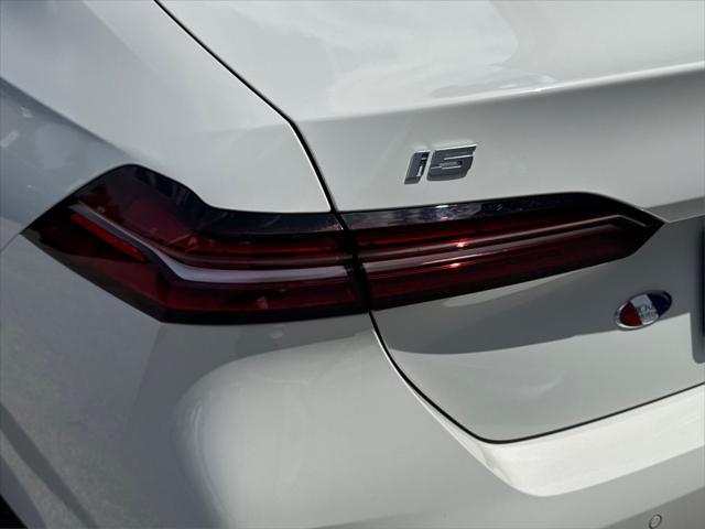 used 2024 BMW i5 car, priced at $47,000