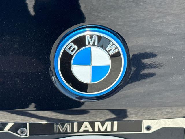 used 2024 BMW i5 car, priced at $49,500