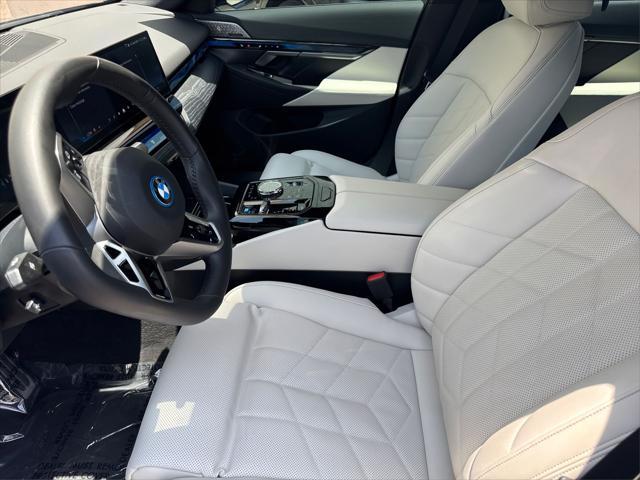 used 2024 BMW i5 car, priced at $49,500