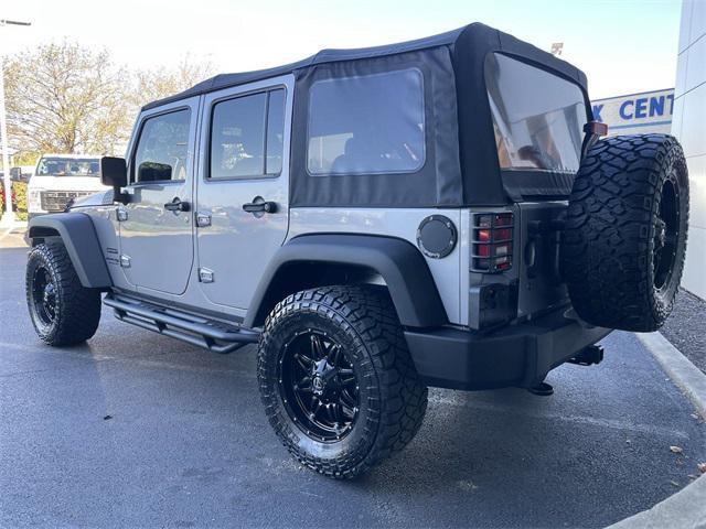 used 2018 Jeep Wrangler JK Unlimited car, priced at $23,077