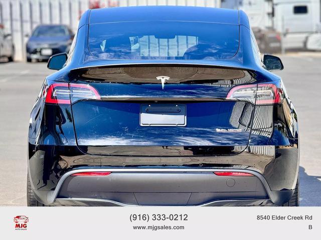 used 2022 Tesla Model Y car, priced at $33,495