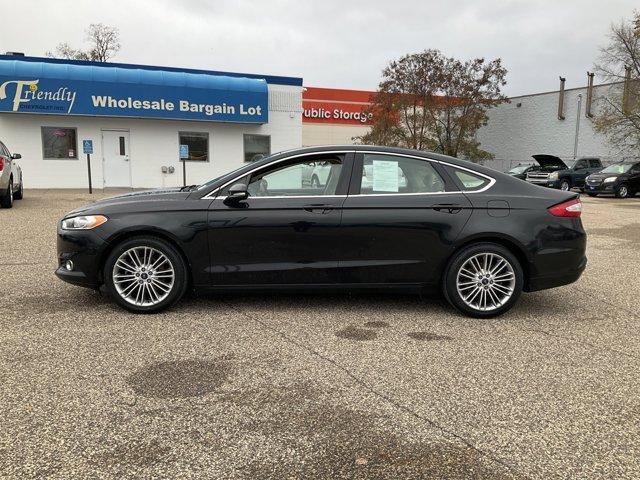 used 2014 Ford Fusion car, priced at $11,599