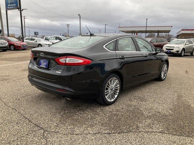 used 2014 Ford Fusion car, priced at $11,599