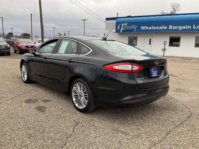 used 2014 Ford Fusion car, priced at $11,599