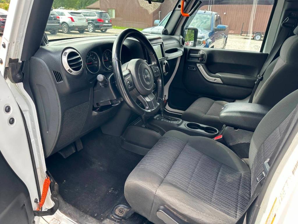used 2011 Jeep Wrangler Unlimited car, priced at $10,855