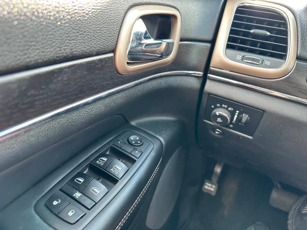 used 2014 Jeep Grand Cherokee car, priced at $11,355