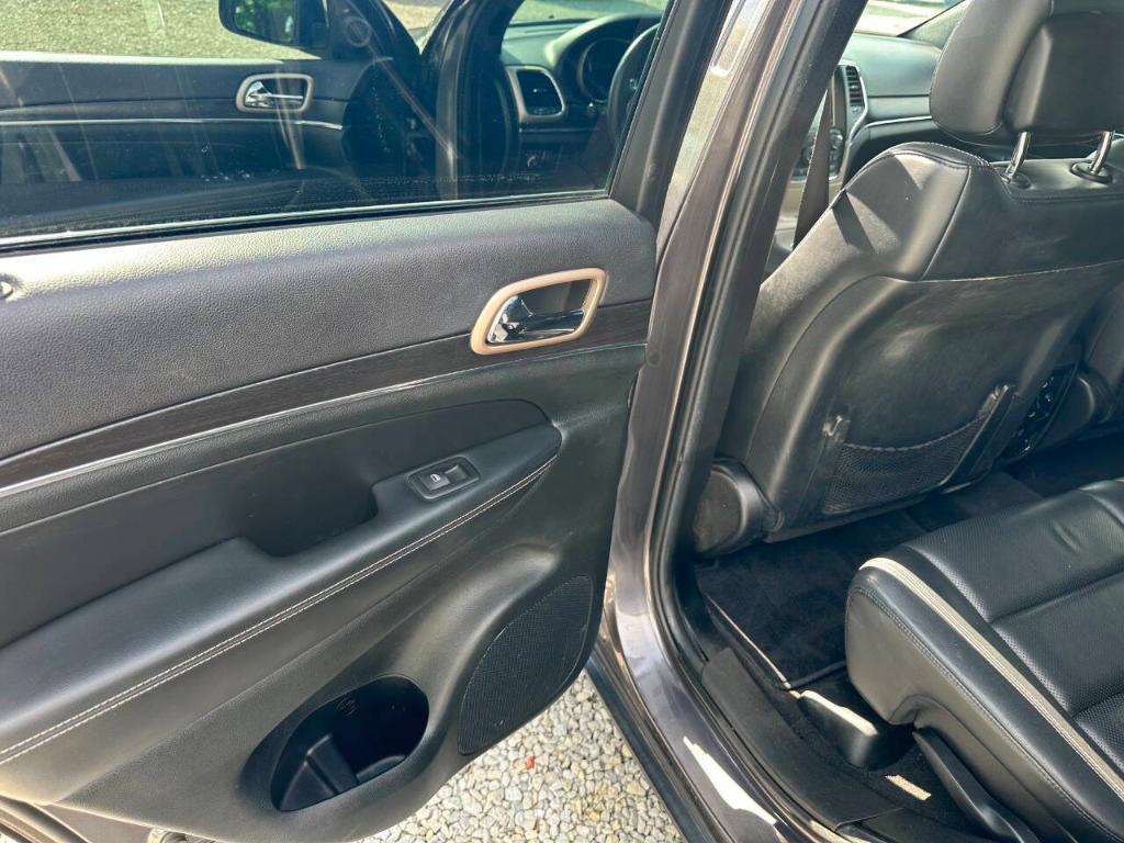 used 2014 Jeep Grand Cherokee car, priced at $11,355