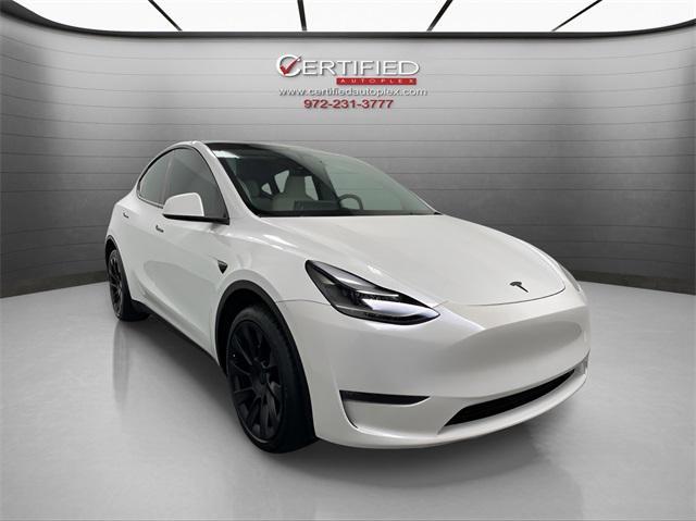 used 2024 Tesla Model Y car, priced at $38,996