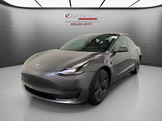 used 2023 Tesla Model 3 car, priced at $27,596