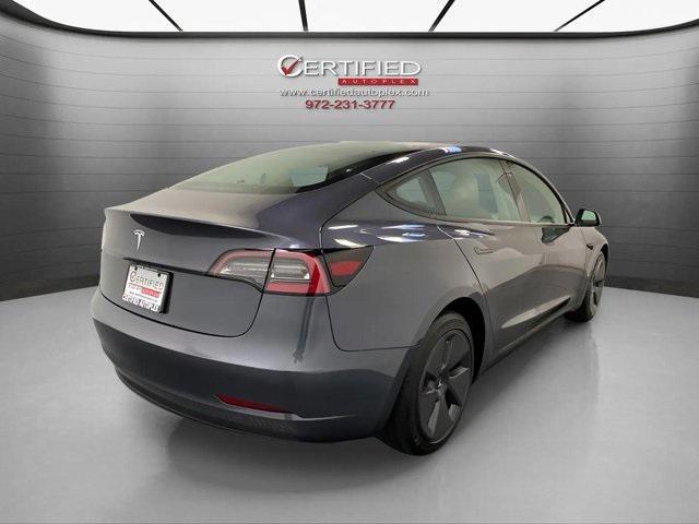 used 2023 Tesla Model 3 car, priced at $27,596