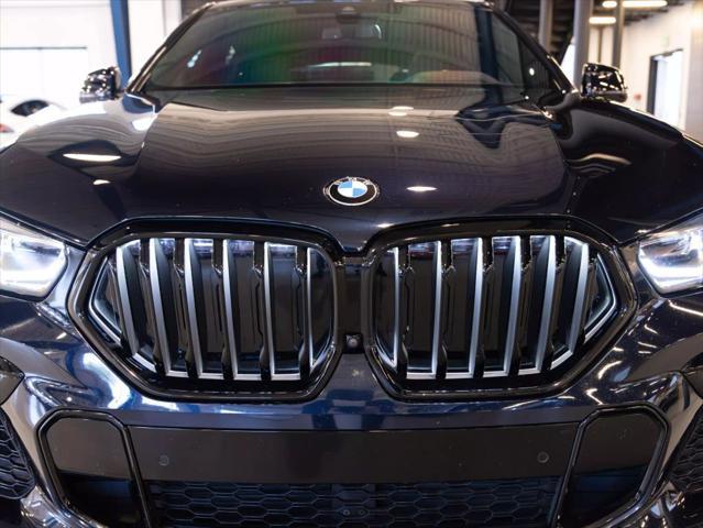 used 2022 BMW X6 car, priced at $57,990