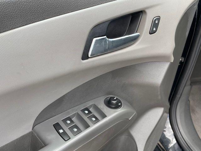 used 2015 Chevrolet Sonic car, priced at $10,977