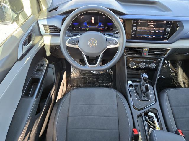 used 2024 Volkswagen Taos car, priced at $23,553