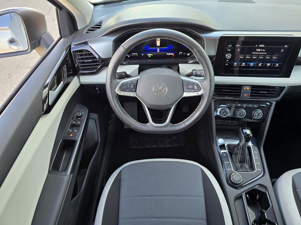 used 2025 Volkswagen Taos car, priced at $22,955