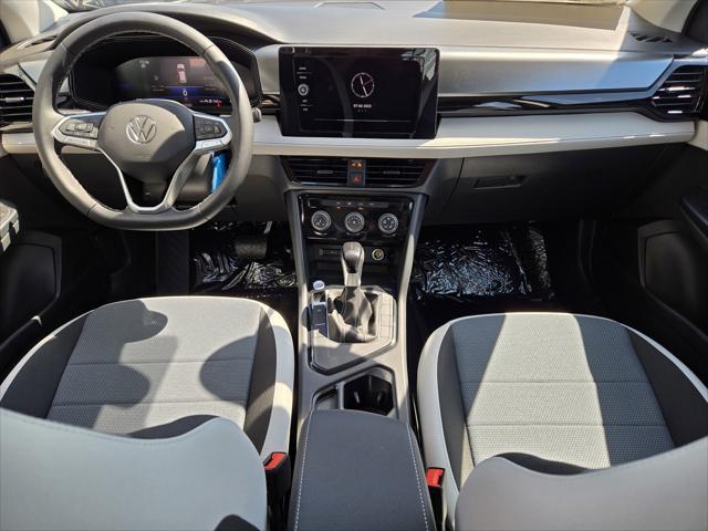 new 2025 Volkswagen Taos car, priced at $24,716